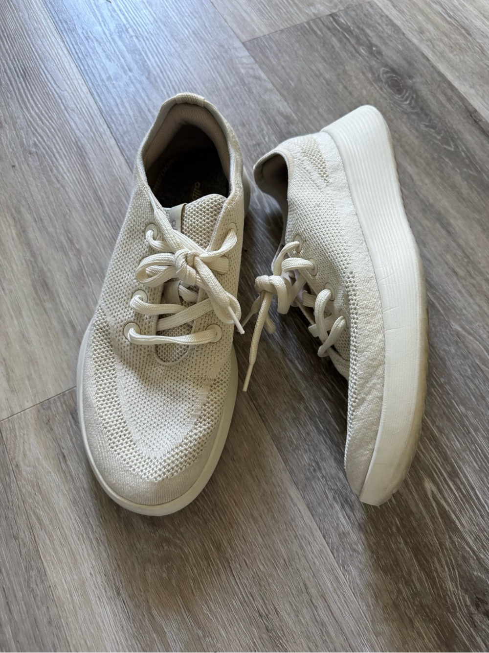 Allbirds Tree Runner Go shoes in a creamy white color